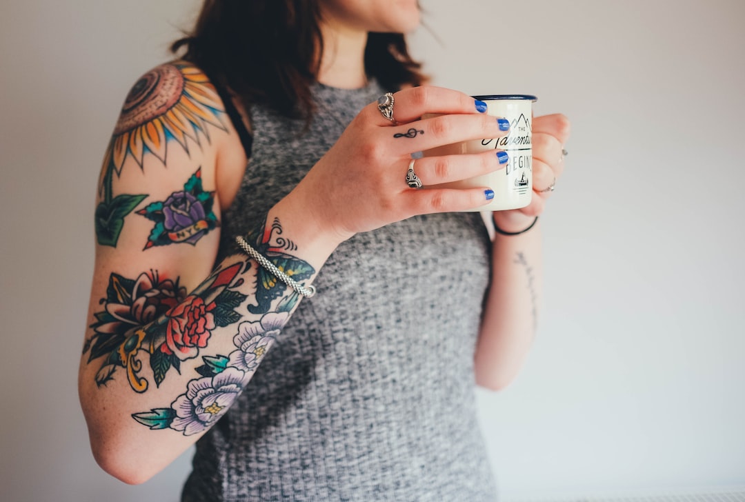 Arm sleeve tattoo